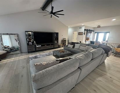 Open living area with sectional seating in a Dublin, OH home update