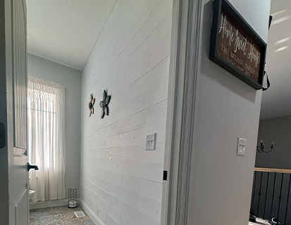 Interior hallway with modern flooring in a Dublin, OH renovation