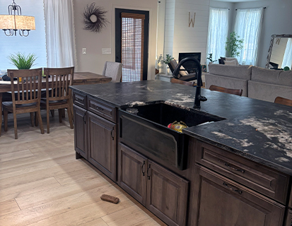 Custom kitchen island with stone countertop in a Dublin, OH remodel