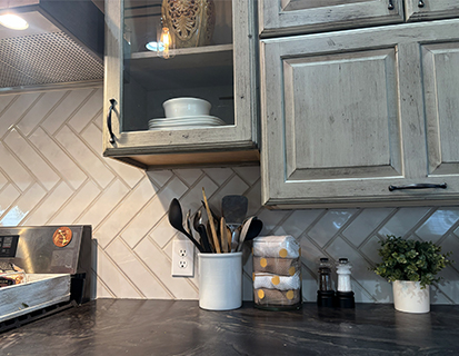 Custom cabinetry and tile backsplash in a Dublin, OH kitchen remodel