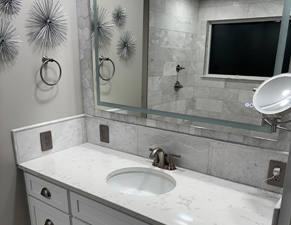 Double vanity with framed mirrors in a Worthington, OH bathroom renovation